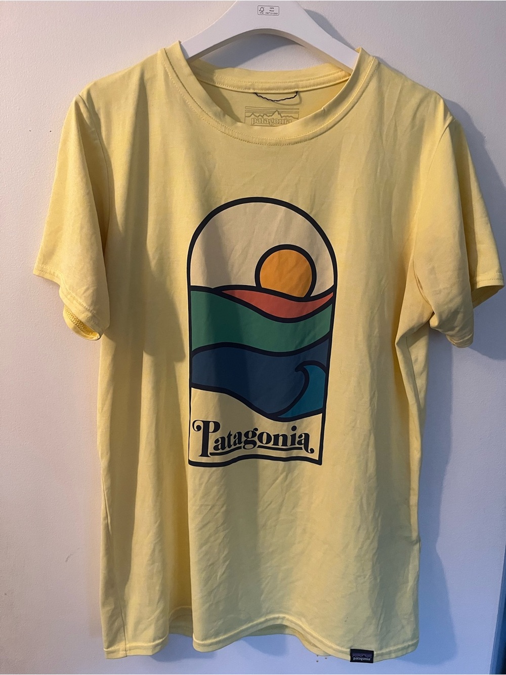 Patagonia Yellow Tee with Multicolor Wave & Sun Graphic